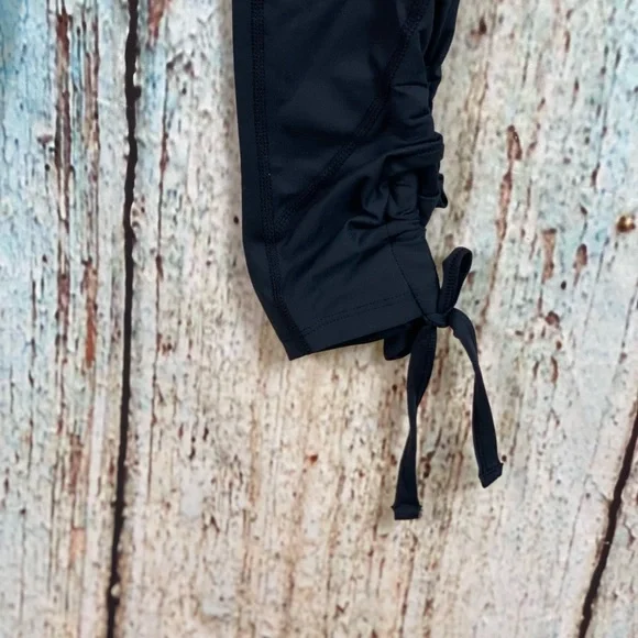 FREE PEOPLE NWOT Black Swerve Tie Ankle Leggings - Picture 12 of 16